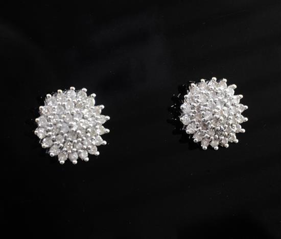 A pair of 18ct white gold and diamond cluster ear studs, diameter 11.5mm.